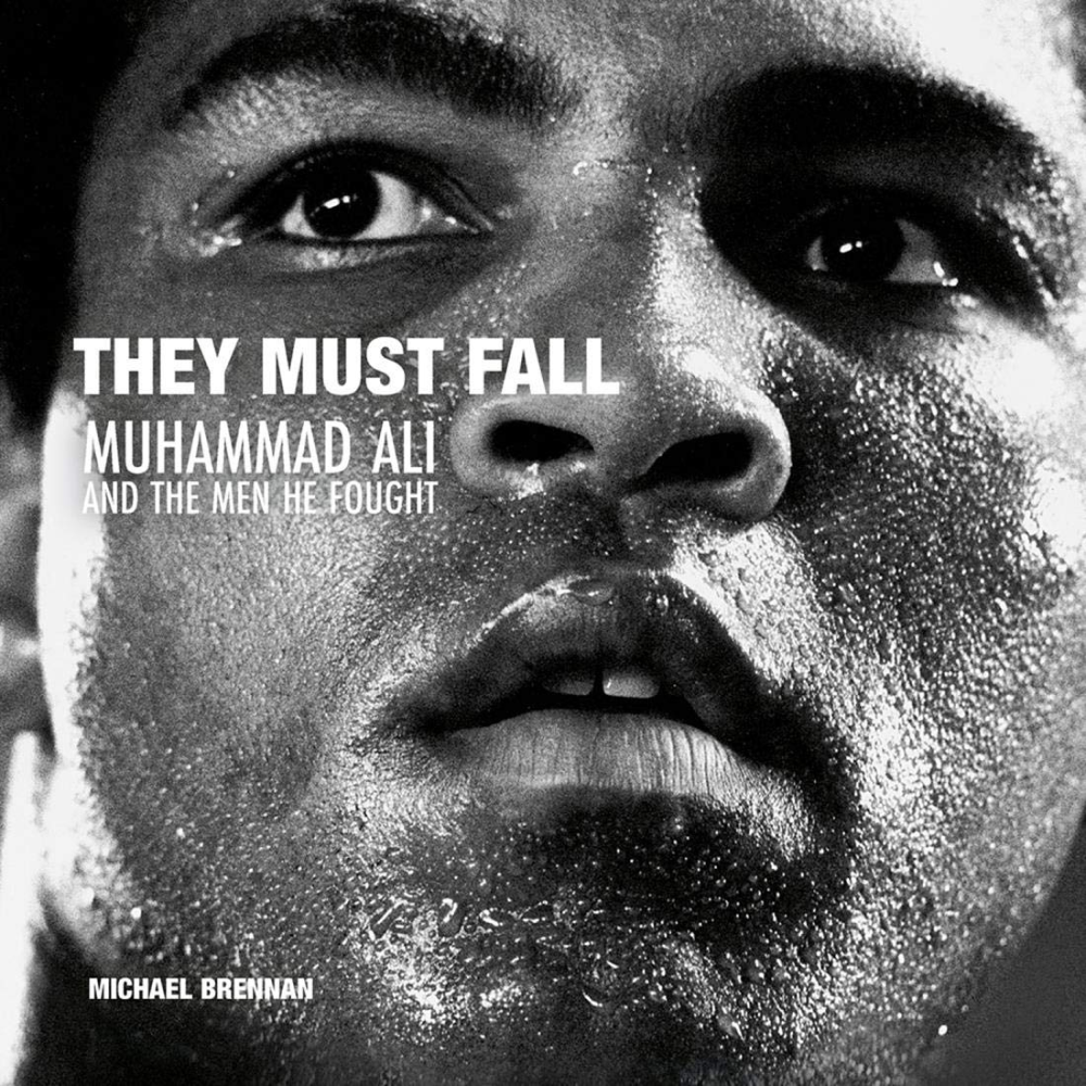 Книга на английском языке "They Must Fall. Muhammad Ali and the Men He Fought"